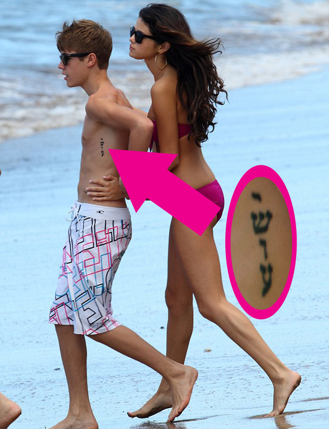 Race mixing queer Justin Bieber has a Hebrew tattoo. I wonder why?
