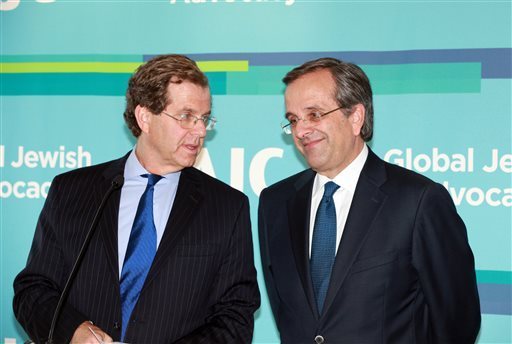 Criminal Greek Prime Minister Samaras being congratulated by the head of the American Jewish Committee, two days after the arrests.
