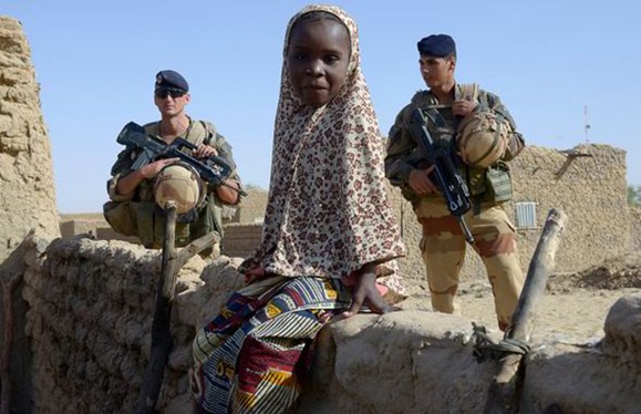 An African child hiding where she knows she wont get raped