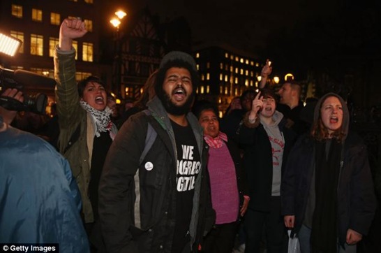 Demonstrators yelling abuse outside The Royal Courts of Justice in London Demonstrators yelling abuse outside The Royal Courts of Justice in London