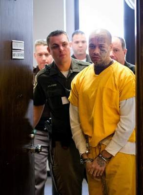 Nikko Jenkins is led in and out of Judge Peter Bataillon's courtroom at the Douglas County Courthouse in Omaha in November Nikko Jenkins is led in and out of Judge Peter Bataillon's courtroom at the Douglas County Courthouse in Omaha in November