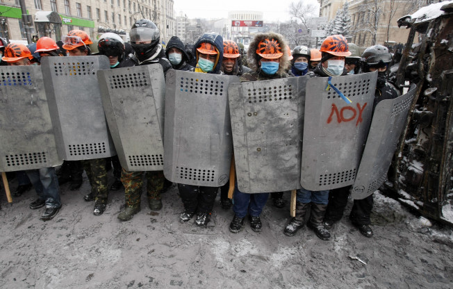 Nope, not armed revolutionaries, these are just protesters voicing their dissatisfaction with the government.
