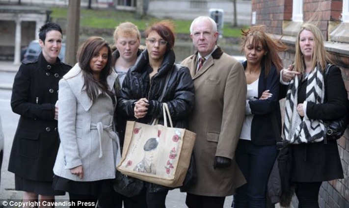 David Collins' Mother Lisa Marie Minnott (centre) with (from left) Sharon Hewitt, Sonia Puri (David's aunt), Michelle McHale, Colonel Mike Glover, Adele Waring (David's aunt) and Tina Smith outside Stockport Coroners Court
