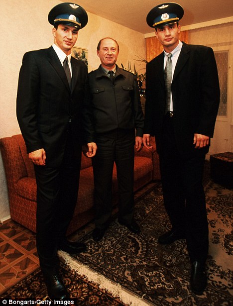Vitali, left and Wladimir Klitschko with father Wladimir at their home in Kiev.