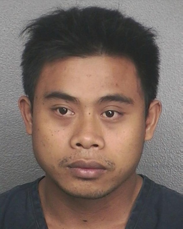 Ketut Pujayasa, 28, a former Holland America cruise worker, allegedly confessed to raping and trying to throw a passenger overboard on Valentine's Day during a cruise that left Fort Lauderdale, Fla. Ketut Pujayasa, 28, a former Holland America cruise worker, allegedly confessed to raping and trying to throw a passenger overboard on Valentine's Day during a cruise that left Fort Lauderdale, Fla.