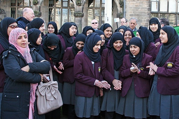 Students from Rochdale Girls School at the flag raising