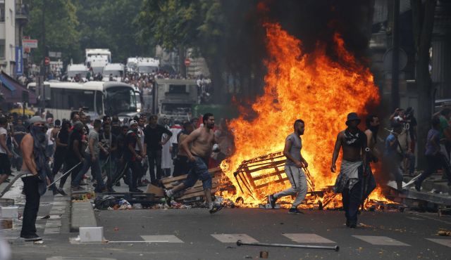 Traditional Frenchmen, engaging in a traditional French street riot.