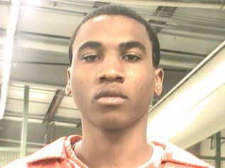 The face of a true criminal mastermind who thought of pretending to be a corpse to escape the cops.