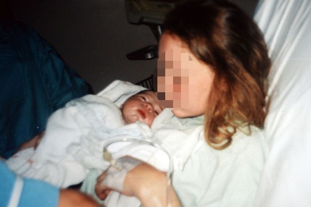 "Jane" of Rotherham with her Paki baby.