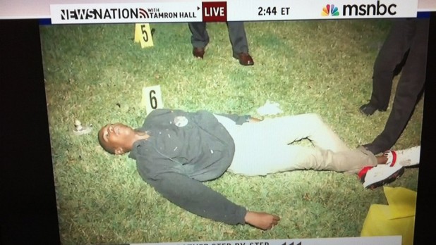Here's the same picture where you can see his face. Hardly "graphic."